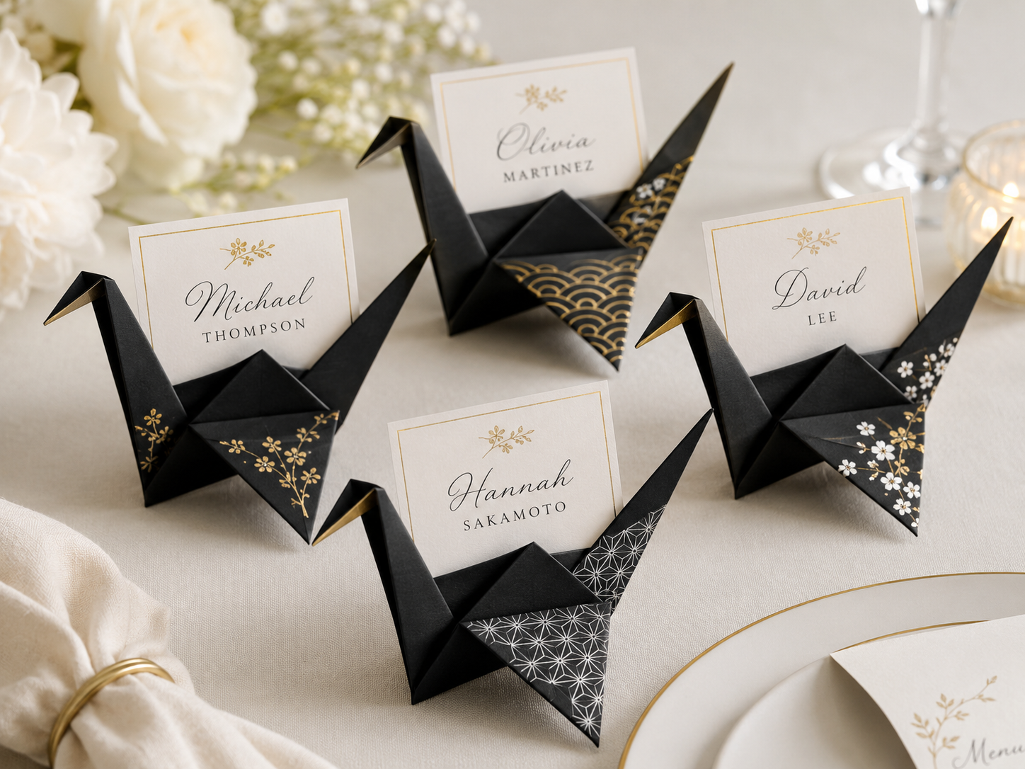 Origami crane place card holders on wedding reception tables